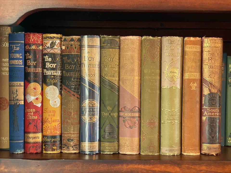 Shelf and spine of Drew's copy of The Boy Travellers in South America