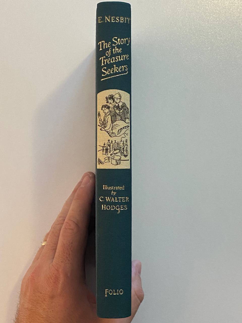 Shelf and spine of Drew's copy of The Story of the Treasure Seekers