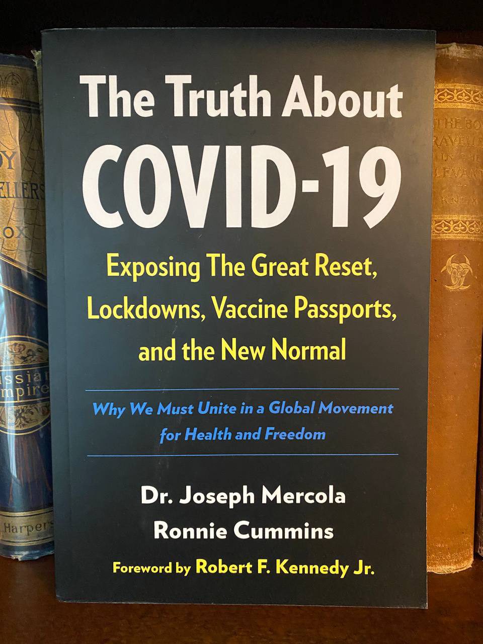 Cover of Drew's copy of The Truth About COVID-19