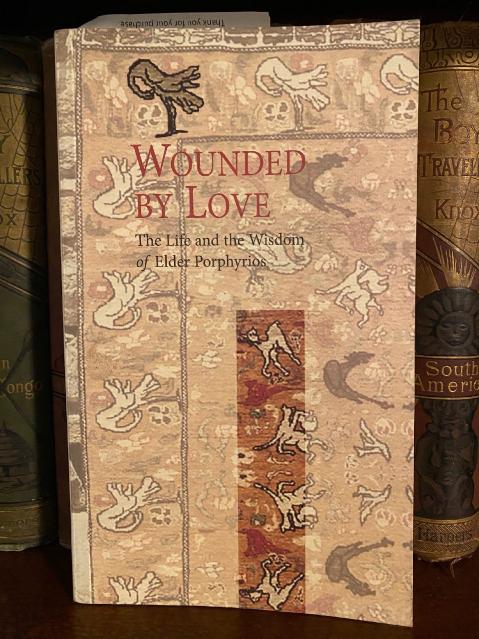 Front cover of Drew's copy of Wounded by Love: The Life and the Wisdom of Elder Porphyrios