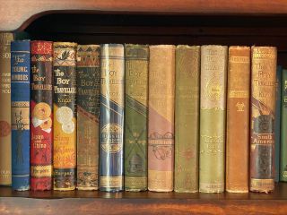 The decorated spines of Drew's Thomas W. Knox books together on a shelf